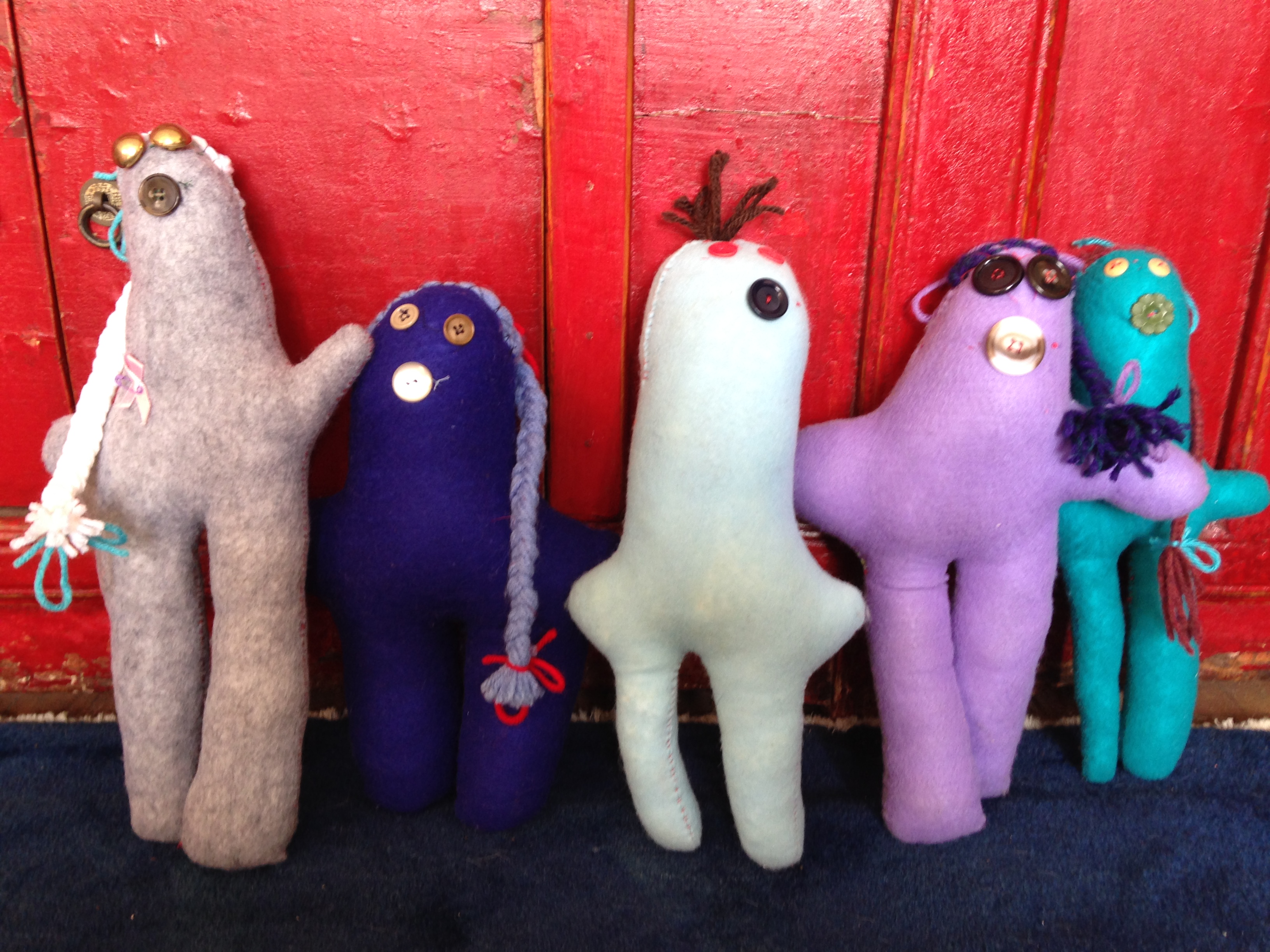 A selection of medium-sized handmade dolls